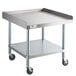 A Regency stainless steel equipment stand with wheels.