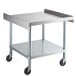 A stainless steel Regency equipment stand with wheels.