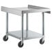 A Regency stainless steel equipment stand with casters.