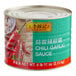 A white tin can of Lee Kum Kee Chili Garlic Sauce.