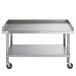 A large stainless steel Regency equipment stand with casters.