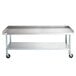 A white rectangular Regency stainless steel equipment stand with casters and a shelf.