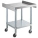 A Regency stainless steel equipment stand with casters.