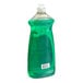 A green plastic bottle of Palmolive dishwashing liquid with a green lid.