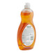 A Palmolive plastic bottle of orange liquid with a white label.
