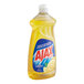 A bottle of Ajax lemon dish detergent on a kitchen counter.