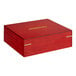 A red wooden box with gold lettering for Twinings tea.