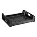 A black plastic Baker's Lane bread tray with holes.