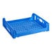 A blue plastic Baker's Lane bread tray with holes.