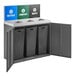 A Lancaster Table & Seating dark gray steel rectangular waste receptacle with three black bins.