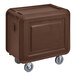 A dark brown Cambro service cart with closed sides and 3 shelves on wheels.