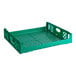 A green plastic grid with holes for bread.