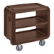 A brown plastic Cambro service cart with 3 shelves and swivel casters.