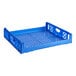 A blue plastic crate with handles and holes.