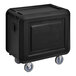 A black Cambro service cart with closed sides and 3 shelves on 4 swivel casters.