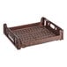 A brown plastic Baker's Lane bread tray with holes.