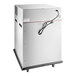A white Cooking Performance Group SlowPro cook and hold oven with black cords.