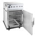 A large silver Cooking Performance Group SlowPro cook and hold oven with a door open.