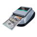 A Kolibri KCD-1000 counterfeit detector on a counter with a digital display showing a hundred dollar bill.