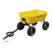 A yellow Gorilla steel dump cart with black wheels and black text.