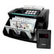 A black Kolibri bill counter with money in it.