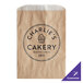 A brown Kraft paper bag with black customizable text.