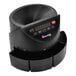 A black Cassida coin counter with a digital display.