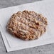 A frozen AdvancePierre Pub Burger patty.