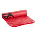 A red plastic roll of 40-45 gallon biohazard bags with a black logo.