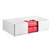 A white box with red plastic bags inside.