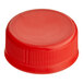 A red plastic Tamper-Evident cap for HPP juice bottles.