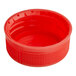 A red plastic tamper-evident cap for juice bottles.