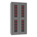 A grey 14 gauge steel storage cabinet with red ventilated doors and red bins.