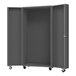 A grey metal Durham storage cabinet with wheels.