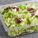 A California Salad Blend in a plastic container.