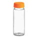 A clear plastic 4 oz. round energy bottle with an orange cap.