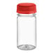 A 2.5 oz. clear plastic round energy bottle with a red plastic lid.