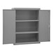 A gray metal shelf cabinet with two shelves and a lockable door.