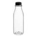A clear plastic carafe juice bottle with a black lid.
