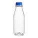 A clear plastic 16 oz. round carafe juice bottle with a blue lid.