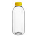 A clear plastic 16 oz. Square Milkman juice bottle with a yellow lid.