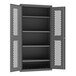 A gray metal cabinet with shelves and a grey metal door with diamond shaped holes.