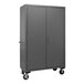A gray metal cabinet with wheels.