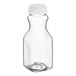 A clear plastic 8 oz. square carafe juice bottle with a clear lid.