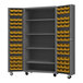 A grey metal Durham storage cabinet with yellow bins.