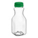 A clear plastic 8 oz. square carafe juice bottle with a green lid.