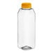 A clear plastic 16 oz. tall square juice bottle with an orange lid.