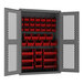 A Durham 14 gauge steel storage cabinet with red bins.