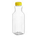 A clear plastic Square PET juice bottle with a yellow cap.
