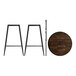 A Lancaster Table & Seating Mid-Century round wooden table top with espresso finish on metal legs.